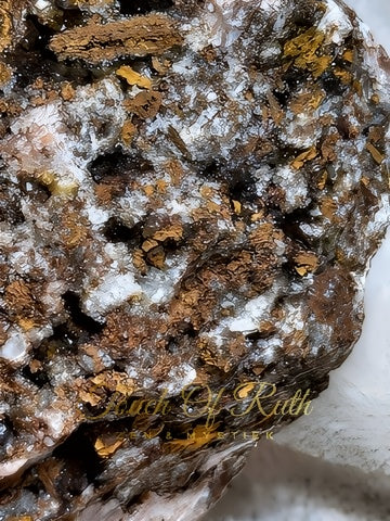 Calciet met Goethiet & Limoniet